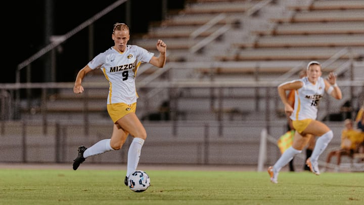 Missouri senior midfielder Milena Fischer attempts a shot at goal that falls just wide.