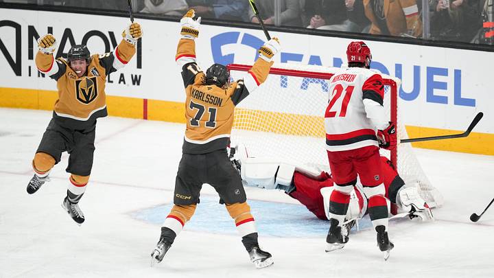 Jun 6, 2026; Las Vegas, Nevada, USA; Vegas Golden Knights right wing Mitch Marner (93) and center William Karlsson (71) celebrates a goal by defenseman Shea Theodore (not pictured) against the Carolina Hurricanes during the second overtime in game three of the 2026 Stanley Cup Final at T-Mobile Arena. Mandatory Credit: Lucas Peltier-Imagn Images