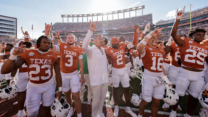 The Texas Longhorns stand for the playing of The Eyes of Texas after defeating the Colorado State Rams at Darrell K Royal-Texas Memorial Stadium on August 31, 2024 in Austin, Texas.