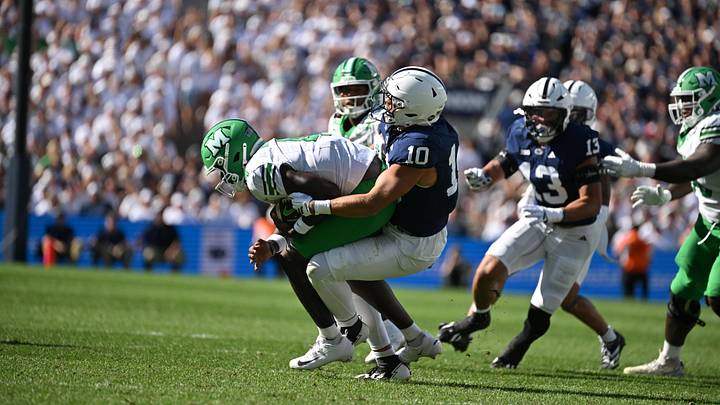 Penn State Nittany Lions defensive end Caleb Bacon makes a tackle vs. the Marshall Thundering Herd at Beaver Stadium.