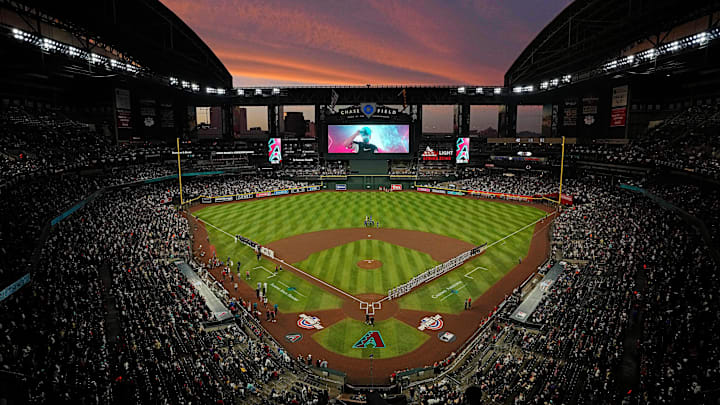 The sun sets as Diamondbacks players are introduced during Opening Day 2024 at Chase Field. The sun sets as Diamondbacks players are introduced during Opening Day 2024 at Chase Field.