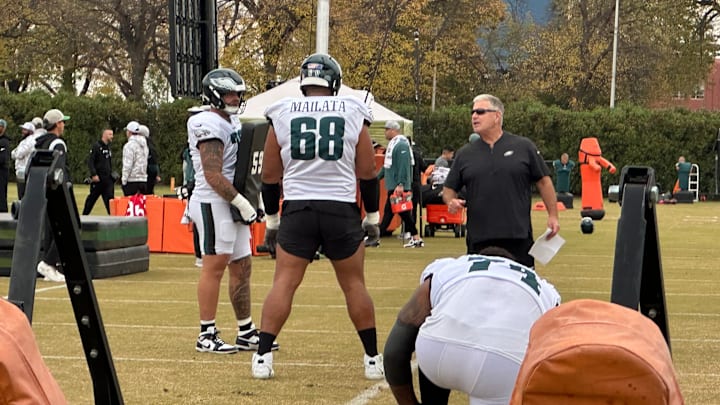 Jordan Mailata gets some coaching tips from line coach Jeff Stoutland during Eagles practice leading up to Week 12's matchup vs. the Rams. Jordan Mailata gets some coaching tips from line coach Jeff Stoutland during Eagles practice leading up to Week 12's matchup vs. the Rams.