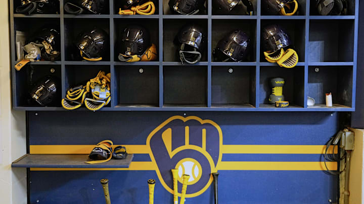 Apr 5, 2025; Milwaukee, Wisconsin, USA; General view of Milwaukee Brewers batting helmets in the dugout prior to the game against the Cincinnati Reds at American Family Field. Mandatory Credit: Jeff Hanisch-Imagn Images Apr 5, 2025; Milwaukee, Wisconsin, USA; General view of Milwaukee Brewers batting helmets in the dugout prior to the game against the Cincinnati Reds at American Family Field. Mandatory Credit: Jeff Hanisch-Imagn Images