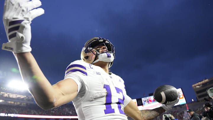 Nov 8, 2025; Madison, Wisconsin, USA;  Washington Huskies wide receiver Denzel Boston (12) celebrates after scoring a touchdown during the second quarter against the Wisconsin Badgers at Camp Randall Stadium. 
