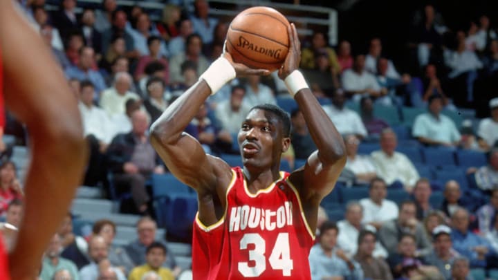 Unknown Date; Miami, FL, USA; FILE PHOTO; Houston Rockets center #34 HAKEEM OLAJUWON in action against the Miami Heat at the Miami Arena during the 1994-95 season. Mandatory Credit: Photo By Imagn Images (c) Copyright Imagn Images
