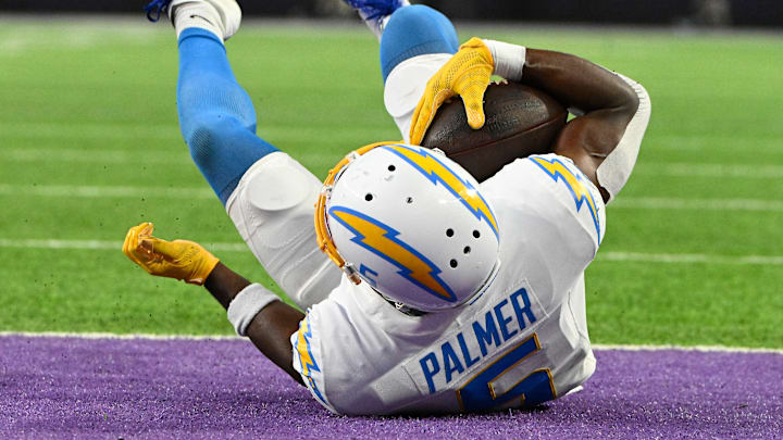 Josh Palmer scores against the Minnesota Vikings.