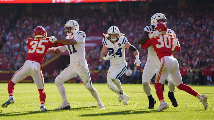 Nov 23, 2025; Kansas City, Missouri, USA;  Indianapolis Colts tight end Tyler Warren (84) runs against the Kansas City Chiefs in the second quarter at GEHA Field at Arrowhead Stadium. Mandatory Credit: Jay Biggerstaff-Imagn Images