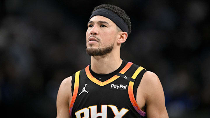Mar 9, 2025; Dallas, Texas, USA; Phoenix Suns guard Devin Booker (1) looks on during the second quarter against the Dallas Mavericks at the American Airlines Center. Mandatory Credit: Jerome Miron-Imagn Images