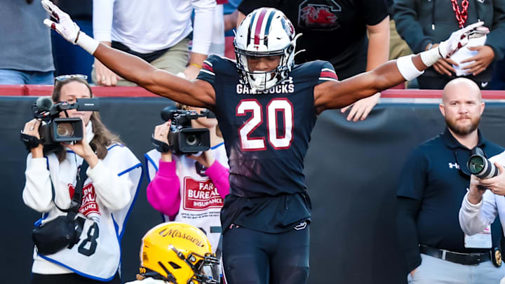 Nov 16, 2024; Columbia, South Carolina, USA; South Carolina Gamecocks defensive back Judge Collier (20) celebrates defending Missouri Tigers wide receiver Theo Wease Jr. (1) on a pass in the first quarter at Williams-Brice Stadium. Mandatory Credit: Jeff Blake-Imagn Images Nov 16, 2024; Columbia, South Carolina, USA; South Carolina Gamecocks defensive back Judge Collier (20) celebrates defending Missouri Tigers wide receiver Theo Wease Jr. (1) on a pass in the first quarter at Williams-Brice Stadium. Mandatory Credit: Jeff Blake-Imagn Images