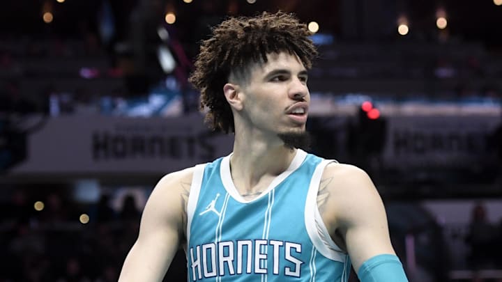 Mar 25, 2025; Charlotte, North Carolina, USA; Charlotte Hornets guard LaMelo Ball (1) looks around after being called for a foul during the second half against the Orlando Magic at the Spectrum Center. Mandatory Credit: Sam Sharpe-Imagn Images Mar 25, 2025; Charlotte, North Carolina, USA; Charlotte Hornets guard LaMelo Ball (1) looks around after being called for a foul during the second half against the Orlando Magic at the Spectrum Center. Mandatory Credit: Sam Sharpe-Imagn Images