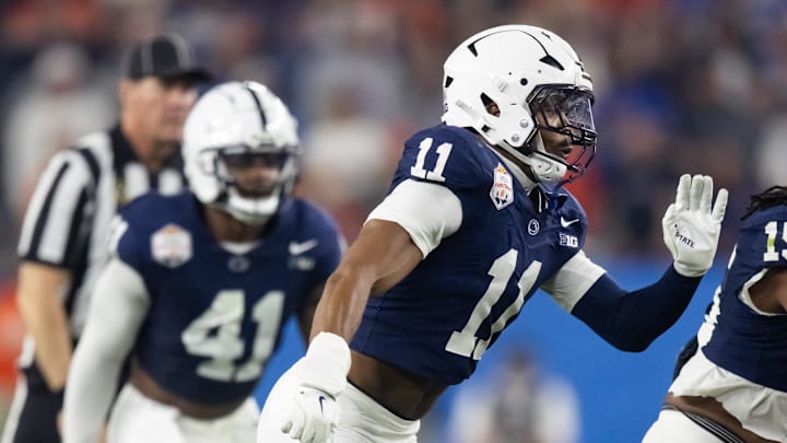 Dec 31, 2024; Glendale, AZ, USA; Penn State Nittany Lions defensive end Abdul Carter (11) against the Boise State Broncos in the Fiesta Bowl at State Farm Stadium. Dec 31, 2024; Glendale, AZ, USA; Penn State Nittany Lions defensive end Abdul Carter (11) against the Boise State Broncos in the Fiesta Bowl at State Farm Stadium.