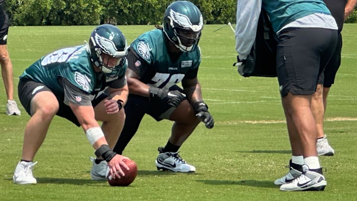 Eagles rookie Drew Kendall gets ready to snap the ball with veteran Kenyon Green at left guard during an OTA on June 3, 2025.