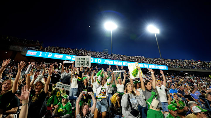 Oregon fans cheer during following Women's College World Series softball game between the Oregon Ducks and the Ole Miss Rebels at Devon Park in Oklahoma City, Friday, May, 30, 2025.