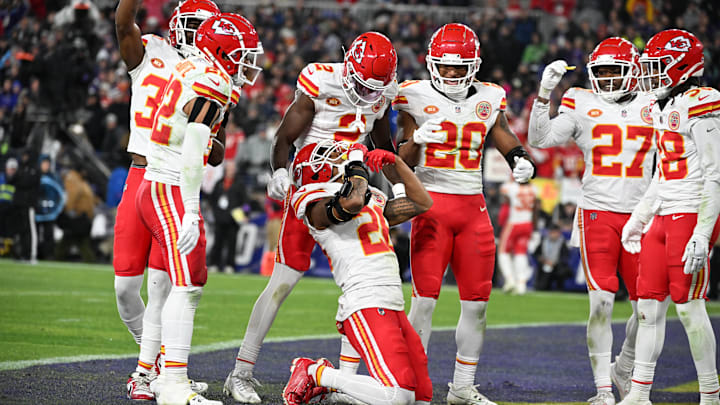 Jan 28, 2024; Baltimore, Maryland, USA; Kansas City Chiefs safety Deon Bush (26) celebrates with teammates after intercepting a pass in the end zone in the second half against the Baltimore Ravens in the AFC Championship football game at M&T Bank Stadium. Mandatory Credit: Tommy Gilligan-USA TODAY Sports