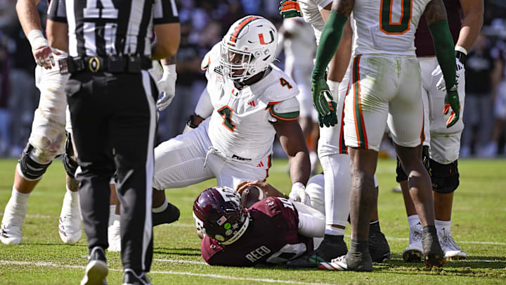 Dec 20, 2025; College Station, TX, USA; Miami Hurricanes defensive lineman Rueben Bain Jr. (4) sacks Texas A&M Aggies quarterback Marcel Reed (10) during the game between the Aggies and the Hurricanes at Kyle Field. Mandatory Credit: Jerome Miron-Imagn Images