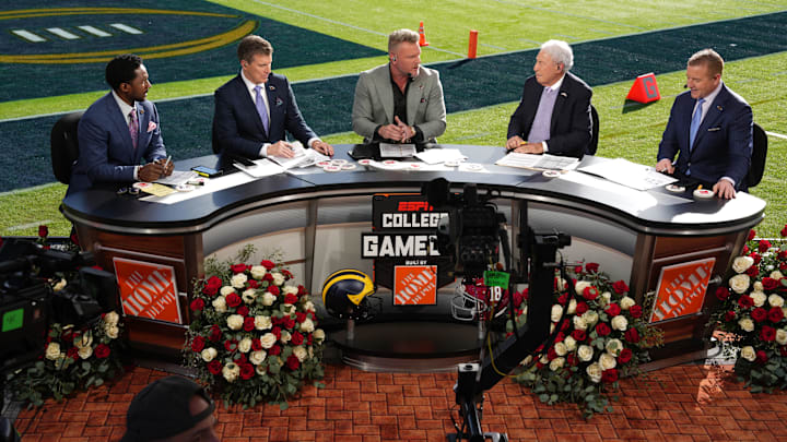 Jan 1, 2024; Pasadena, CA, USA; From left: Desmond Howard, Rece Davis, Pat McAfee, Lee Corso and Kirk Herbstreit on the ESPN College Gameday set at the 2024 Rose Bowl college football playoff semifinal game at Rose Bowl. Mandatory Credit: Kirby Lee-USA TODAY Sports