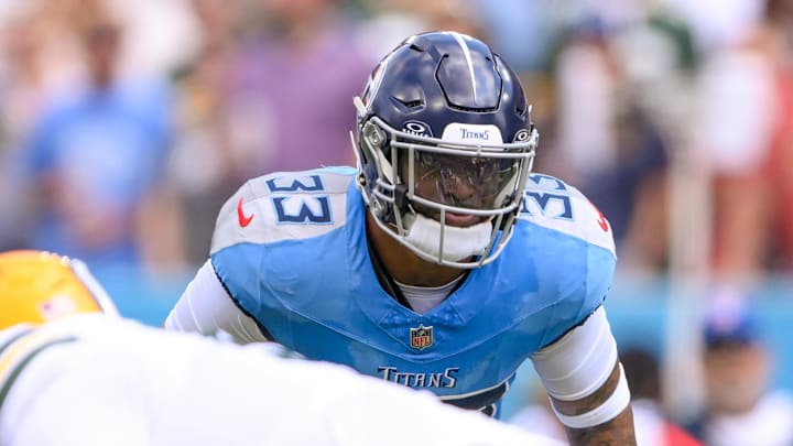 Sep 22, 2024; Nashville, Tennessee, USA;  Tennessee Titans safety Jamal Adams (33) sneaks a peak into the backfield at Nissan Stadium. Mandatory Credit: Steve Roberts-Imagn Images