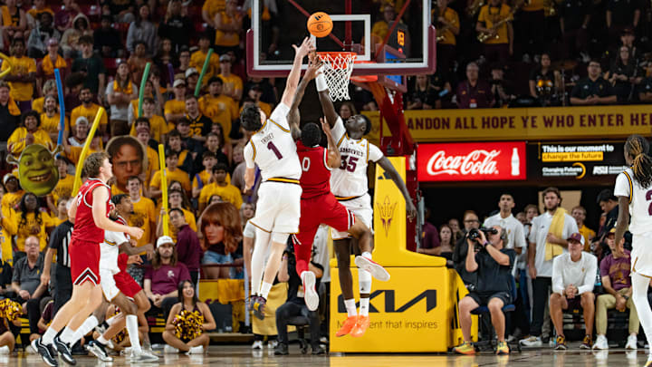 Arizona State Sun Devils Santiago Trouet (1) and Massamba Diop (35) attempt to block Southern Utah Thunderbirds Isaiah Cottrell (0) during a game at Desert Financial Arena in Tempe on Nov. 4, 2025. Arizona State Sun Devils Santiago Trouet (1) and Massamba Diop (35) attempt to block Southern Utah Thunderbirds Isaiah Cottrell (0) during a game at Desert Financial Arena in Tempe on Nov. 4, 2025.