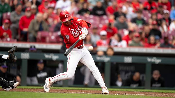 Cincinnati Reds second baseman Matt McLain (9) hits a base hit in the first inning of the MLB baseball game between the Cincinnati Reds and the Colorado Rockies at Great American Ball Park in Cincinnati on Wednesday, April 29, 2026.