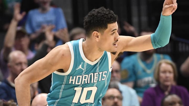 Mar 25, 2025; Charlotte, North Carolina, USA;  Charlotte Hornets guard Josh Green (10) reacts after scoring during the first half against the Orlando Magic at the Spectrum Center. Mandatory Credit: Sam Sharpe-Imagn Images