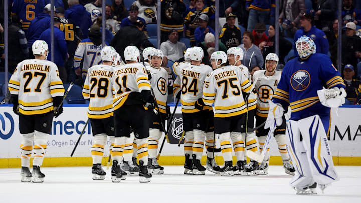 Mar 25, 2026; Buffalo, New York, USA;  The Boston Bruins celebrate a win over the Buffalo Sabres at KeyBank Center. Mandatory Credit: Timothy T. Ludwig-Imagn Images
