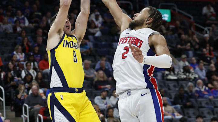 Oct 23, 2024; Detroit, Michigan, USA; Indiana Pacers guard T.J. McConnell (9) shoots on Detroit Pistons guard Cade Cunningham (2) in the second half at Little Caesars Arena. Mandatory Credit: Rick Osentoski-Imagn Images Oct 23, 2024; Detroit, Michigan, USA; Indiana Pacers guard T.J. McConnell (9) shoots on Detroit Pistons guard Cade Cunningham (2) in the second half at Little Caesars Arena. Mandatory Credit: Rick Osentoski-Imagn Images