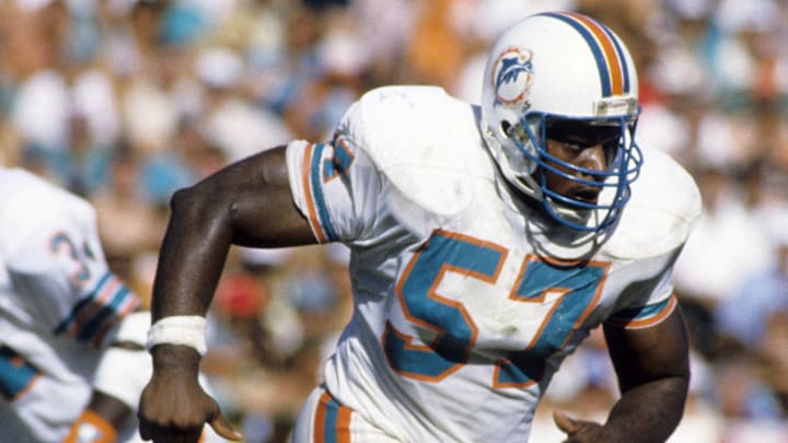 Miami Dolphins center Dwight Stephenson (57) in action against the Cleveland Browns during the 1985 AFC Divisional Playoff Game at the Orange Bowl. 