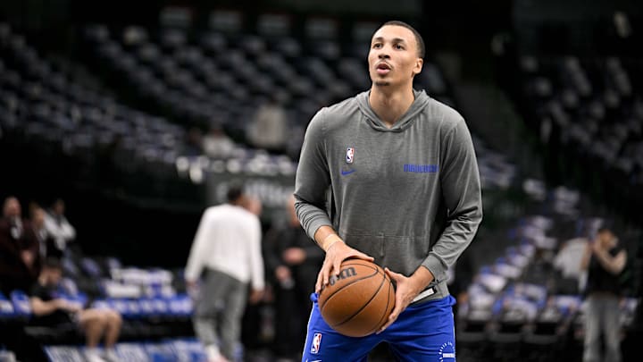 Dante Exum warms up before a game against the Kings. Dante Exum warms up before a game against the Kings.