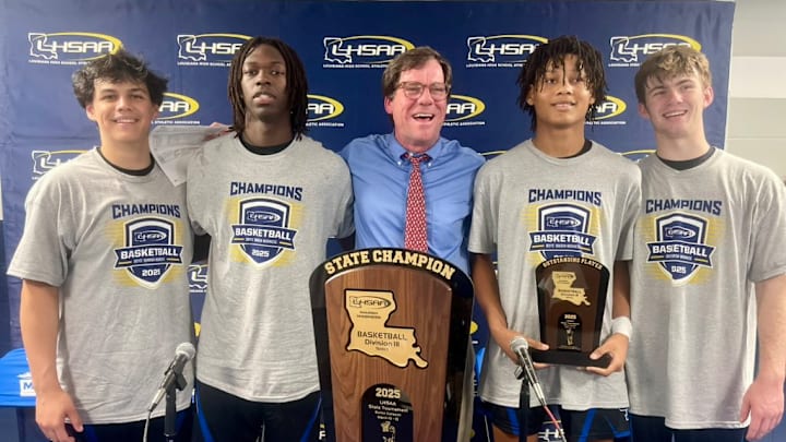 Curtis McAllister (second from right) was named Outstanding Player of the Division III select championship game.