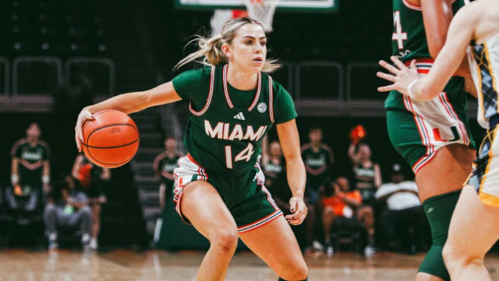 Senior Haley Cavinder (14) looking to score against Quinnipiac in the Miami Thanksgiving Tournament
