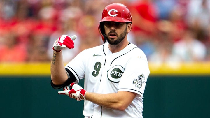 Cincinnati Reds third baseman Mike Moustakas hit three doubles in his first game back.