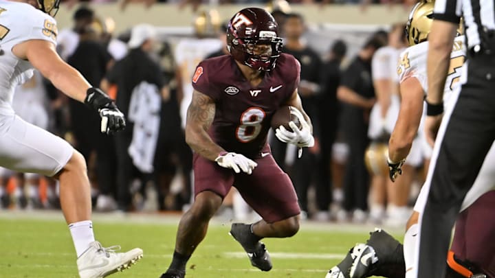 Sep 6, 2025; Blacksburg, Virginia, USA; Virginia Tech Hokies running back Terion Stewart (8) runs the ball during the second quarter at Lane Stadium. Mandatory Credit: Brian Bishop-Imagn Images