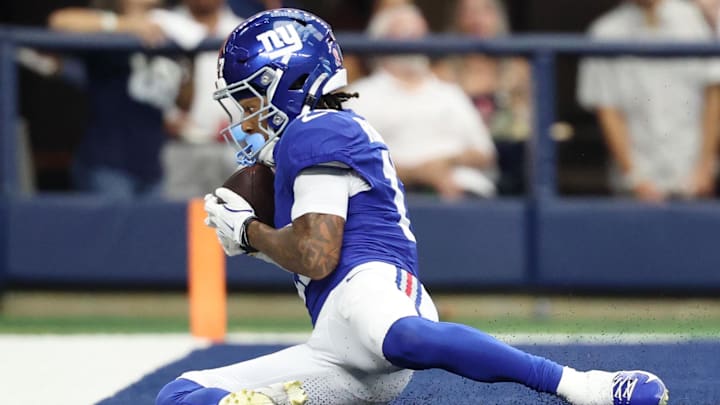 New York Giants wide receiver Wan'Dale Robinson (17) makes a catch for a touchdown against the New York Giants during the fourth quarter at AT&T Stadium. 