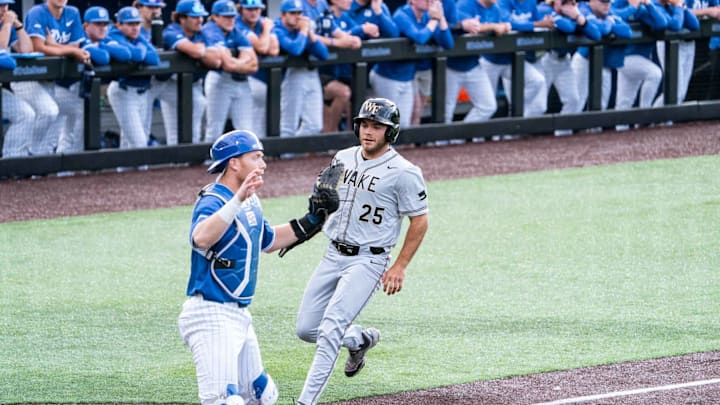 Wake Forest outfielder Boston Torres comes in to score against Duke