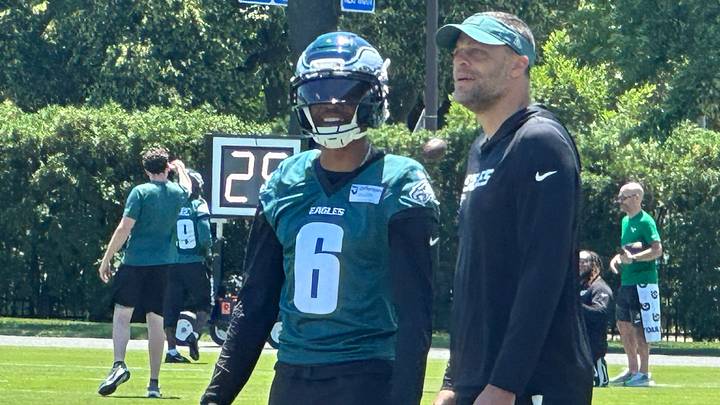 Eagles' WR1 DeVonta Smith with receivers coach Aaron Moorehead at practice on June 2, 2026.