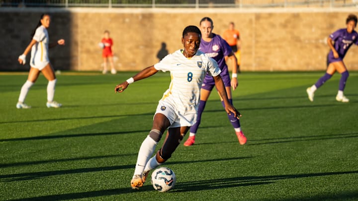 Pitt Women's Soccer midfielder Deborah Abiodun dribbles in the 4-1 win over Clemson Pitt Women's Soccer midfielder Deborah Abiodun dribbles in the 4-1 win over Clemson