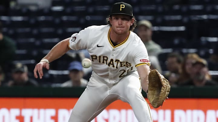 Pittsburgh Pirates first baseman Billy Cook (28) takes a throw at first base to retire Milwaukee Brewers catcher William Contreras (not pictured) during the third inning of a game Sept. 24, 2024, at PNC Park in Pittsburgh. Pittsburgh Pirates first baseman Billy Cook (28) takes a throw at first base to retire Milwaukee Brewers catcher William Contreras (not pictured) during the third inning of a game Sept. 24, 2024, at PNC Park in Pittsburgh.