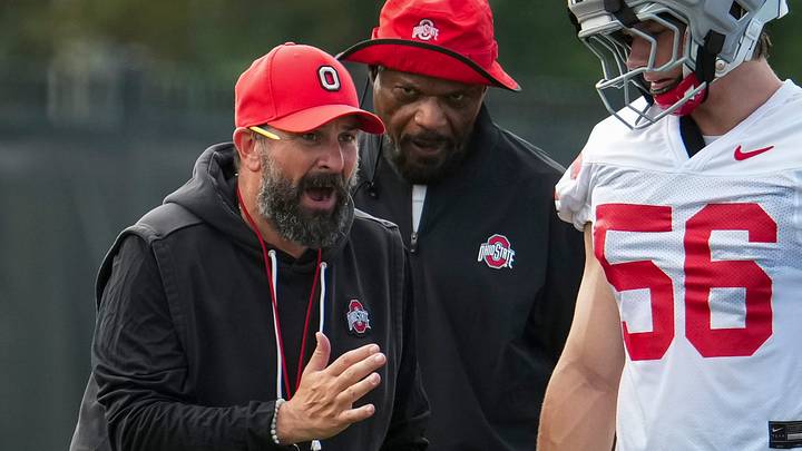 Ohio State Buckeyes defensive coordinator Matt Patricia and defensive line coach Larry Johnson talk to defensive end Nate Riegle (56) during the first practice of training camp at the Woody Hayes Athletic Center in Columbus on Aug. 6, 2026. Ohio State Buckeyes defensive coordinator Matt Patricia and defensive line coach Larry Johnson talk to defensive end Nate Riegle (56) during the first practice of training camp at the Woody Hayes Athletic Center in Columbus on Aug. 6, 2026.