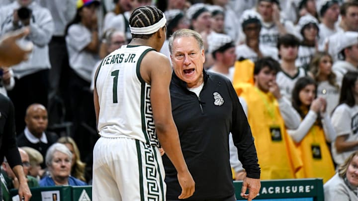 Michigan State's coach Tom Izzo, right, talks with Jeremy Fears Jr. during the second half in the game against Arkansas on Saturday, Nov. 8, 2025, at the Breslin Center in East Lansing. Michigan State's coach Tom Izzo, right, talks with Jeremy Fears Jr. during the second half in the game against Arkansas on Saturday, Nov. 8, 2025, at the Breslin Center in East Lansing.