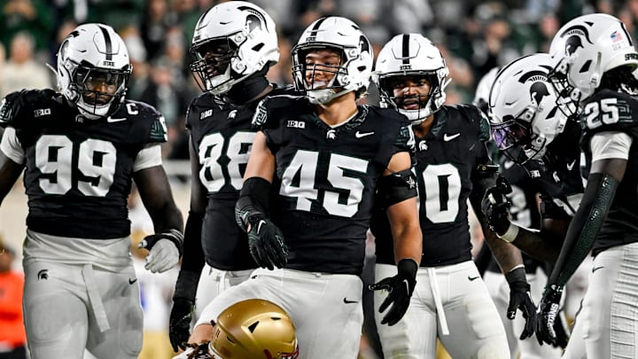 Michigan State's Brady Pretzlaff, center, and the defense celebrate a broken up pass against Boston College during the fourth quarter on Saturday, Sept. 6, 2025, at Spartan Stadium in East Lansing.