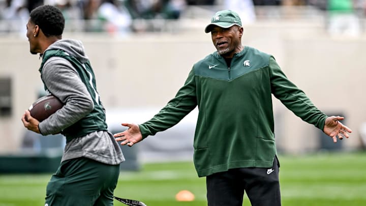 Michigan State's Michigan State's wide receivers coach Courtney Hawkins, right, talks with Jaden Mangham during the Spring Showcase on Saturday, April 20, 2024, at Spartan Stadium in East Lansing. Michigan State's Michigan State's wide receivers coach Courtney Hawkins, right, talks with Jaden Mangham during the Spring Showcase on Saturday, April 20, 2024, at Spartan Stadium in East Lansing.