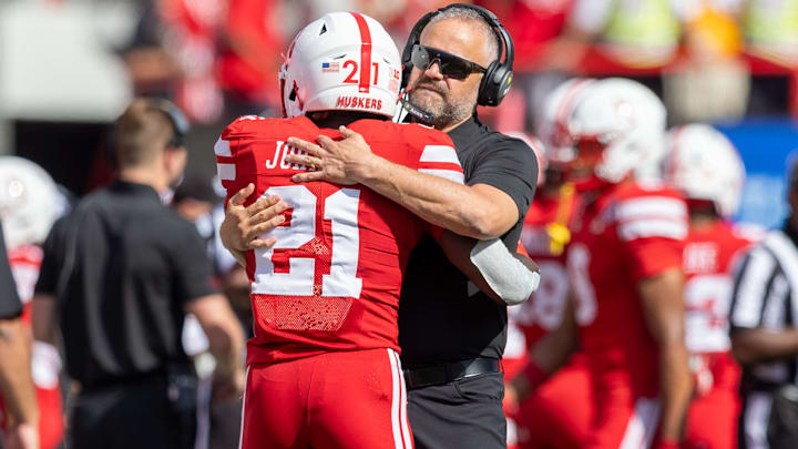 Nebraska coach Matt Rhule and running back Emmett Johnson embrace before a game against Houston Christian. Nebraska coach Matt Rhule and running back Emmett Johnson embrace before a game against Houston Christian.