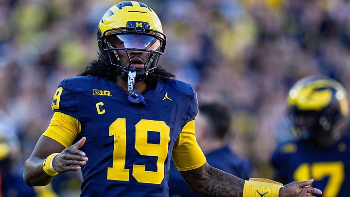Bryce Underwood runs off the field after his pass was intercepted by Penn State during the first half at Michigan Stadium. Bryce Underwood runs off the field after his pass was intercepted by Penn State during the first half at Michigan Stadium.