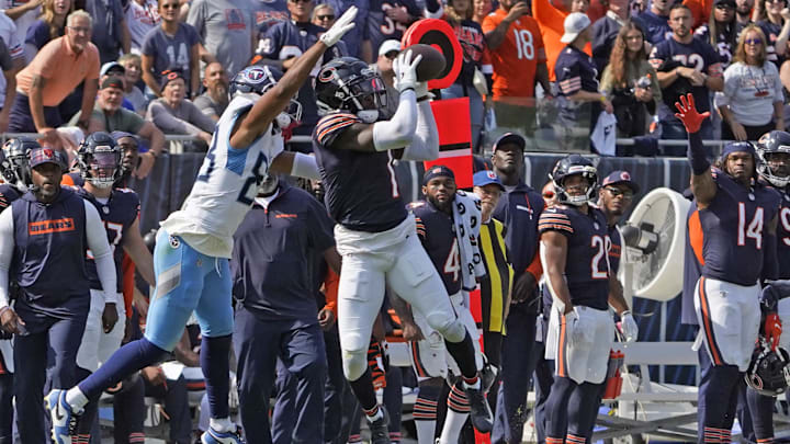 Jaylon Johnson goes up for the game-clinching interception in the fourth quarter during a 24-17 win over Tennessee in the opener.