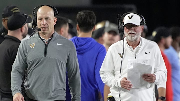 Vanderbilt coach Clark Lea and senior offensive advisor Jerry Kill walk on the sidelines during the third quarter against Kentucky at FirstBank Stadium in Nashville, Tenn., Saturday, Nov. 22, 2025.