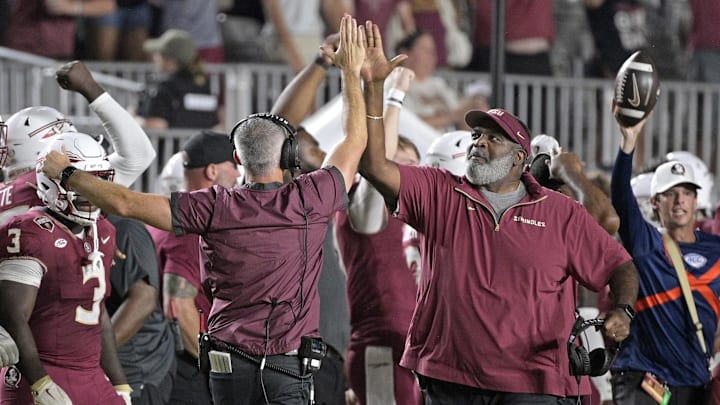 Sep 21, 2024; Tallahassee, Florida, USA; Florida State Seminoles head coach Mike Norvell and associate head coach Odell Haggins high-five after winning against the California Golden Bears at Doak S. Campbell Stadium. Mandatory Credit: Melina Myers-Imagn Images