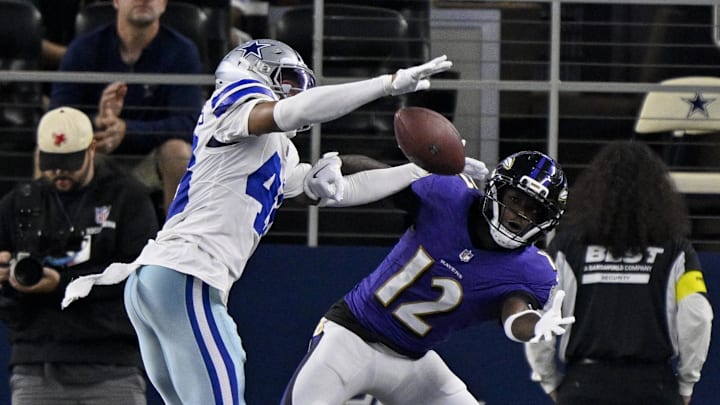 Dallas Cowboys cornerback Zion Childress breaks up a pass intended for Baltimore Ravens wide receiver Malik Cunningham 