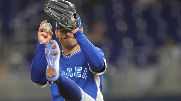 Mar 10, 2026; Miami, FL, United States;  Israel pitcher Harrison Cohen (18) prepares to throw a pitch in the second inning against Netherlands at loanDepot Park. Mandatory Credit: Jim Rassol-Imagn Images