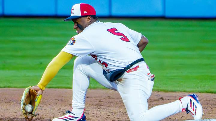 Peoria shortstop Jesús Baéz backhands a tough throw to second for a force out against South Bend during the Chiefs' home opener Tuesday, April 7, 2026 at Dozer Park in Peoria. The Chiefs routed the Cubs 10-1. Peoria shortstop Jesús Baéz backhands a tough throw to second for a force out against South Bend during the Chiefs' home opener Tuesday, April 7, 2026 at Dozer Park in Peoria. The Chiefs routed the Cubs 10-1.