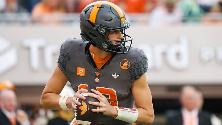 Oct 3, 2026; Knoxville, Tennessee, USA; Tennessee Volunteers quarterback George MacIntyre (12) looks to pass the ball against the Auburn Tigers during the second quarter at Neyland Stadium. Mandatory Credit: Randy Sartin-Imagn Images Oct 3, 2026; Knoxville, Tennessee, USA; Tennessee Volunteers quarterback George MacIntyre (12) looks to pass the ball against the Auburn Tigers during the second quarter at Neyland Stadium. Mandatory Credit: Randy Sartin-Imagn Images